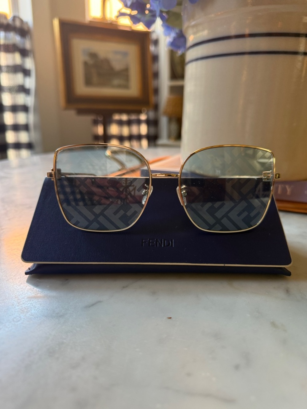 Fendi Gold Frame Sunglasses with Blue Lenses and Signature FF Pattern